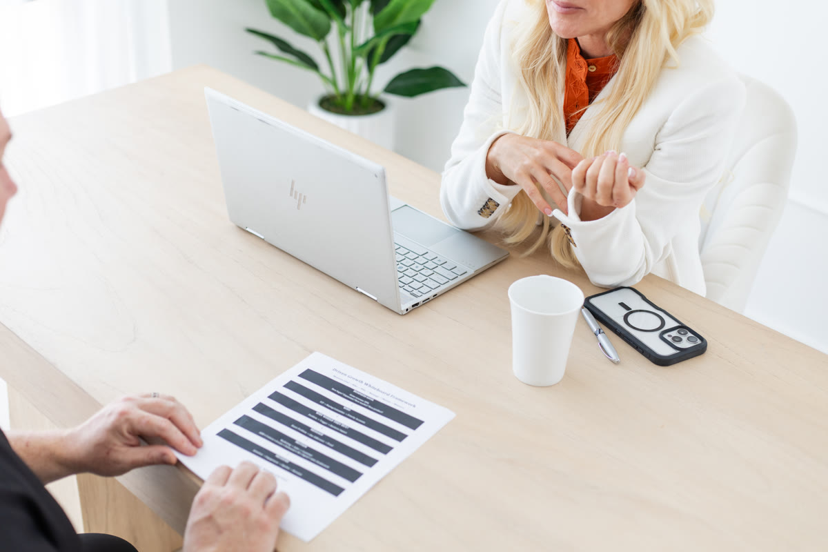 A client reviewing a document during a working session